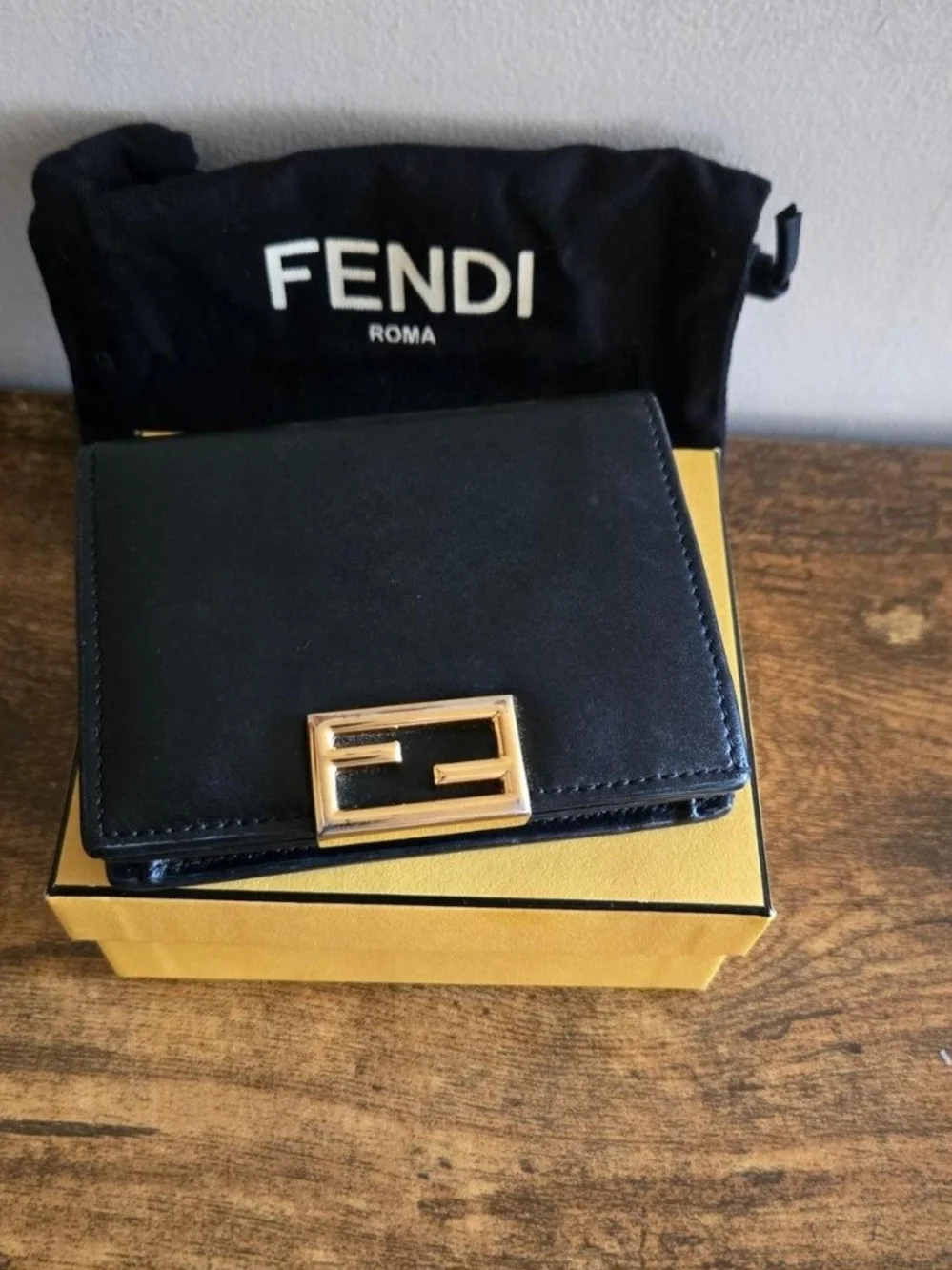 Fendi Black Leather Compact Wallet with Gold FF Buckle